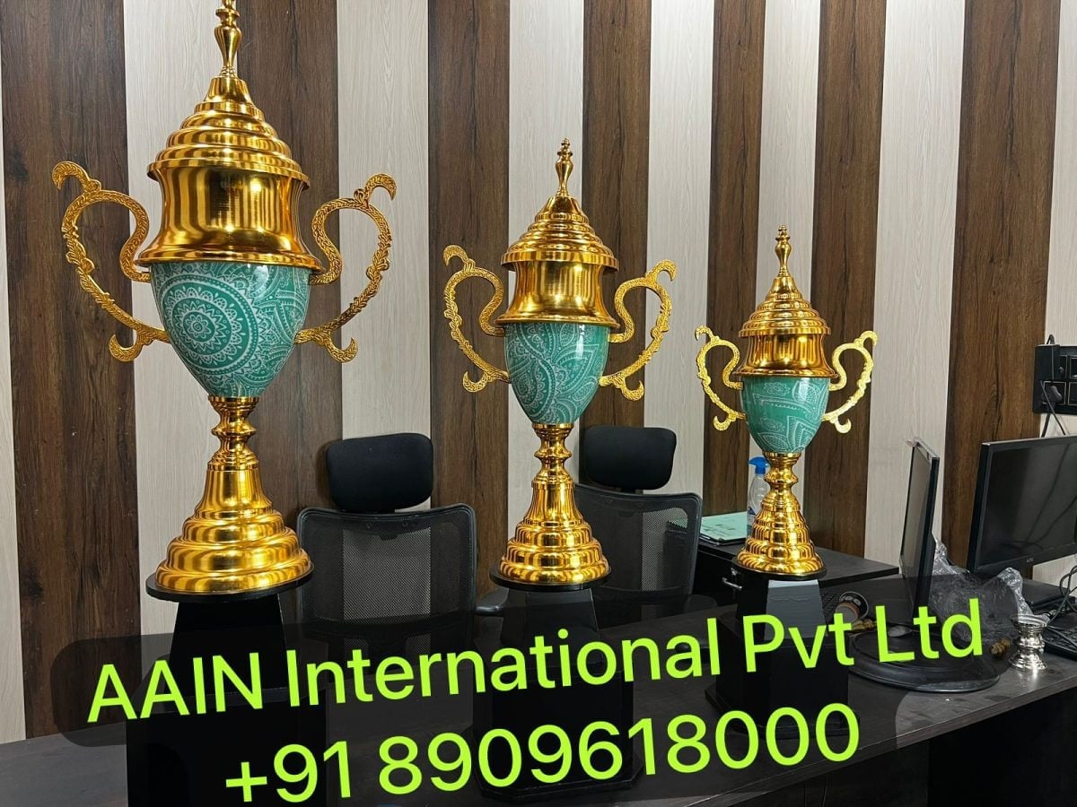 Rolex Cups in three heights with turquoise bowls and tiered gold lids